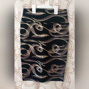 Black and Gold stretchy fabric pencil cut skirt. Size XS